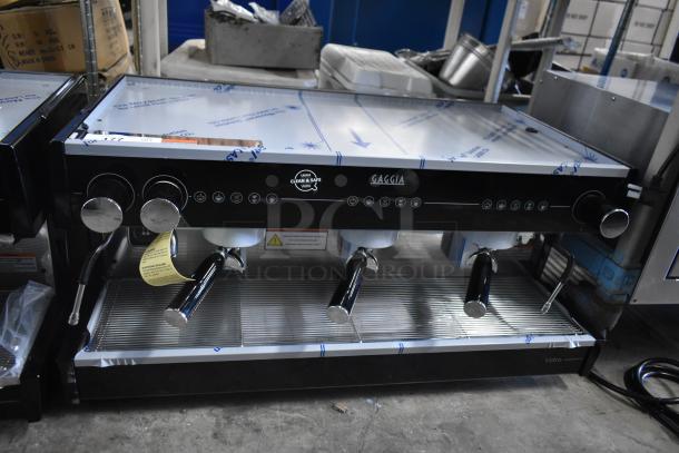 BRAND NEW Gaggia MGV293NPU Vetro Black 3 Group Automatic Espresso Machine, 220/230V, some cosmetic scratches.