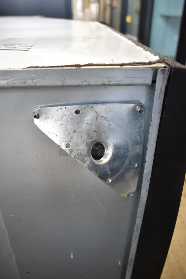 Brand new Avantco 194UCH160A ice machine, 160 lb. capacity, showing minor scratches. 115V, 1 Phase.