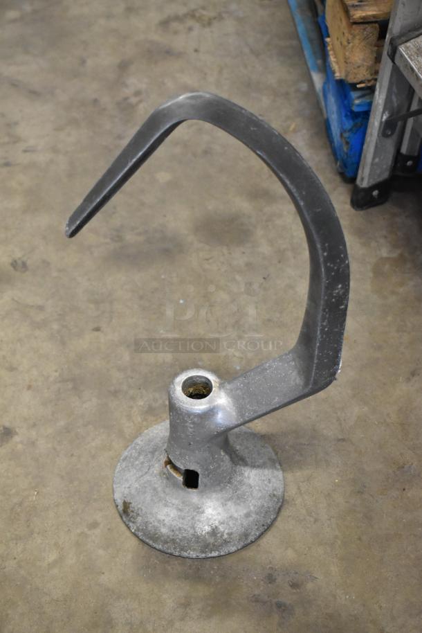 Four metal dough hooks for Hobart mixer, silver, durable, pre-owned, slightly worn, ideal for commercial baking.