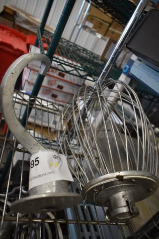 Dough hook and whisk attachments for Hobart Mixer, both in used condition. Includes auction label marked "Qty x2".