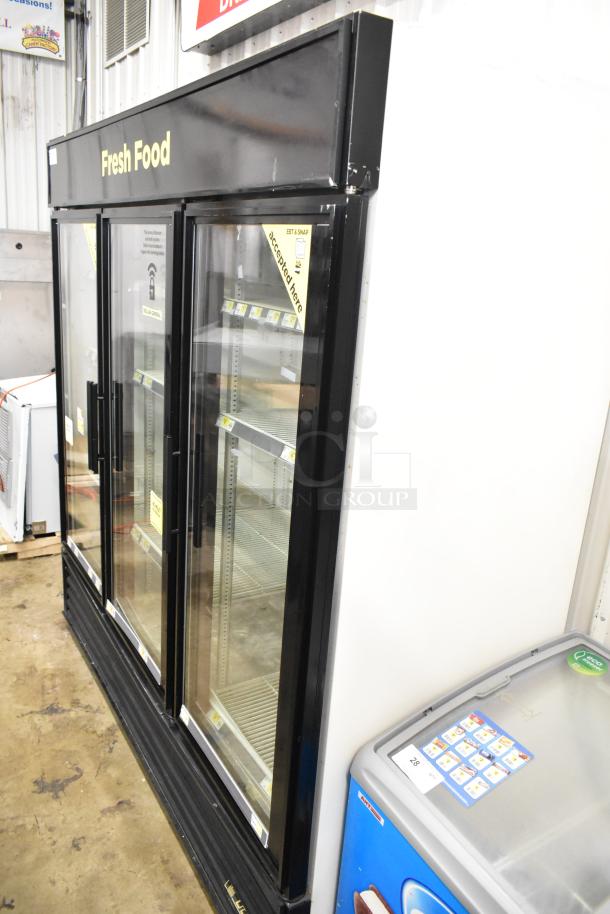 True GDM-72 Commercial 3-Door Reach-In Cooler Merchandiser, black, tested and working, 115 volts, 1 phase.