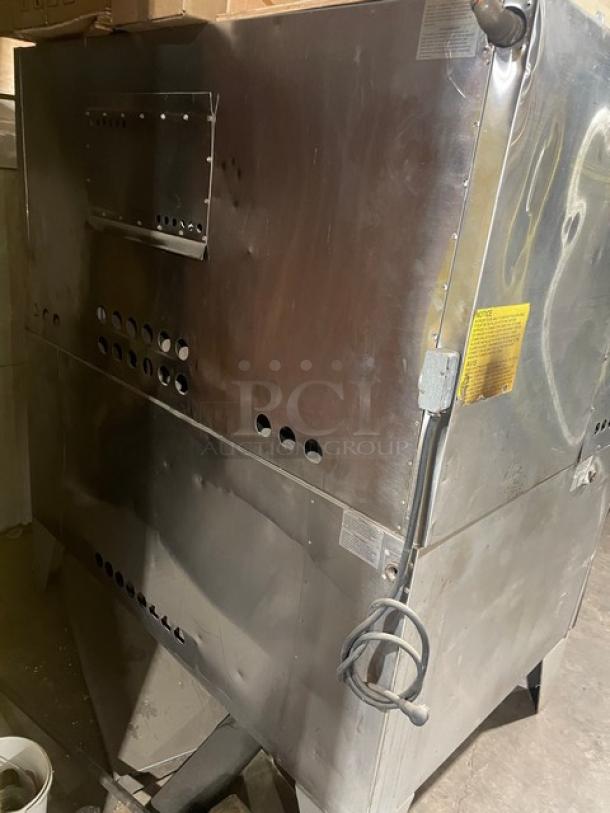 Bakers Pride commercial stainless steel double stacked pizza oven, model FC-516/D125, natural gas, on legs, 1 phase.