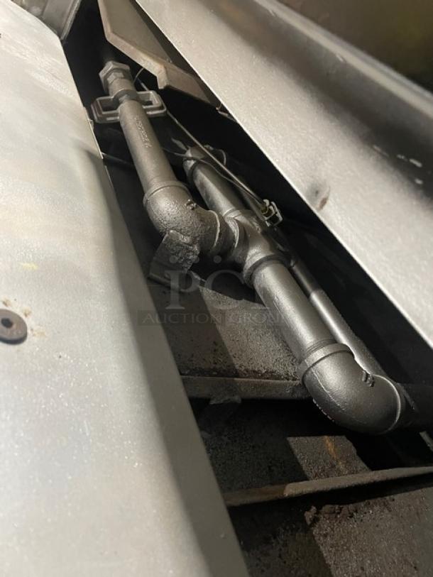 Bakers Pride commercial pizza oven, model FC-516/D125, natural gas, stainless steel, double-stacked, visible internal piping.