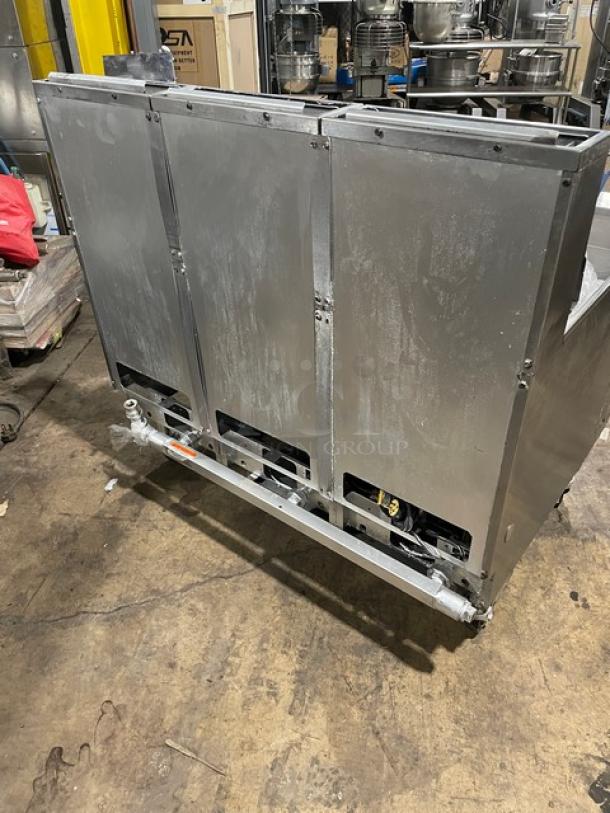 Pitco Frialator SG14JS stainless steel triple-bay deep fryer, natural gas, digital controls, on casters, with basket hanger.