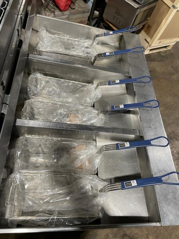 Pitco Frialator SG14-JS triple-bay fryer system, stainless steel, natural gas, digital controls, with fry baskets and backsplash.