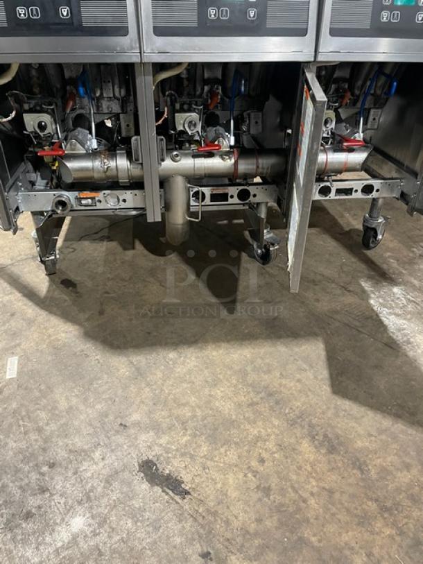 Pitco Frialator SG14JS triple-bay deep fryer with digital controls, backsplash, basket hanger, 120V, on casters.