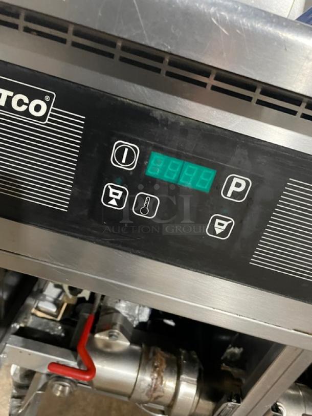 Pitco Frialator SG14JS commercial stainless steel triple-bay fryer with digital control, backsplash, basket hanger; natural gas powered.