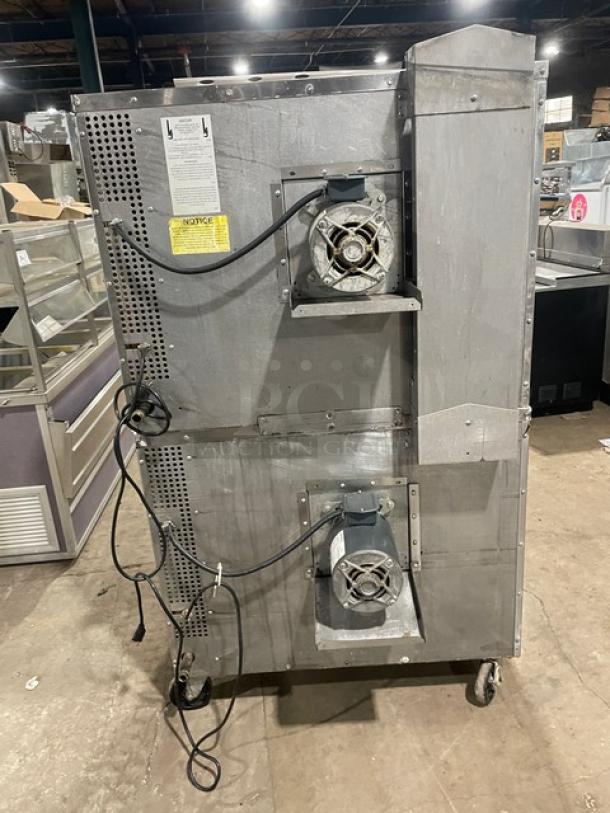 Southbend SL-Series stainless steel gas convection oven, double stacked, wired oven rack, on casters, industrial condition.