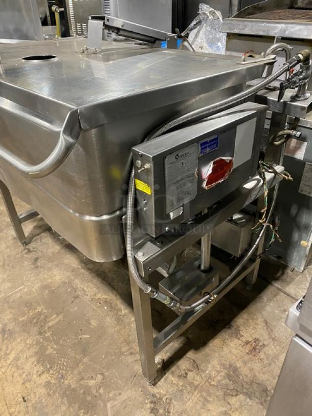 Groen NHFPE4 40 Gal. stainless steel tilt skillet, natural gas, single spout faucet, on legs, commercial use, with power controls.