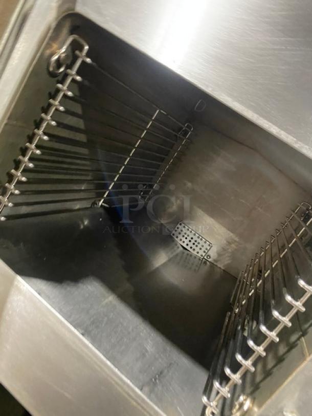 Cleveland Range stainless steel convection steamer interior, model 24CGA62S, with SureCook controls and pan holding racks.