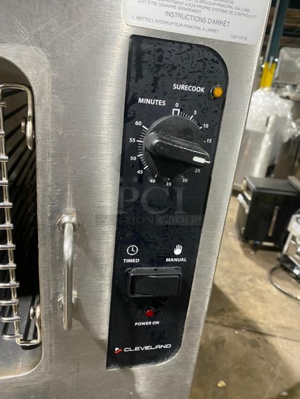 Cleveland Range dual compartment convection steamer, model 24CGA6.2S, with SureCook controls, visible pan racks, and power indicators.