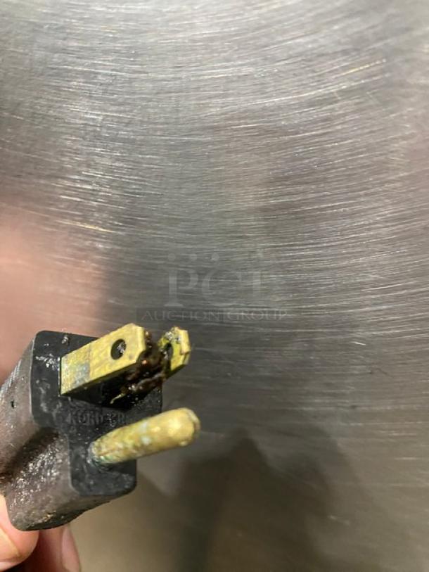 Cleveland Range stainless steel dual compartment convection steamer, Model 24CGA62S, features SureCook controls and pan racks.