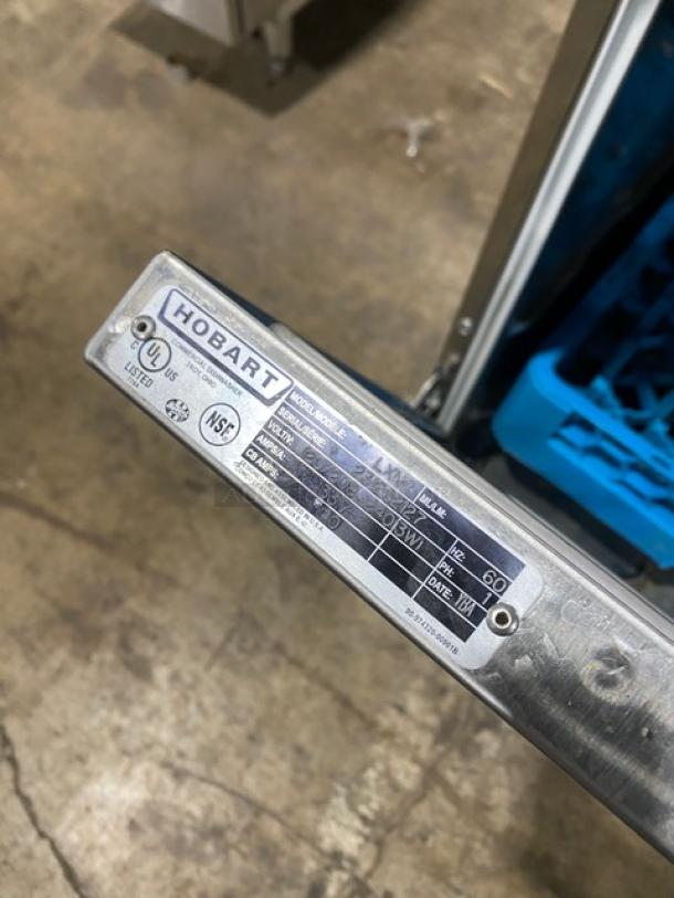 Hobart Advansys LXNR commercial dishwasher, stainless steel, Energy Star certified, model plate visible with UL, NSF labels.