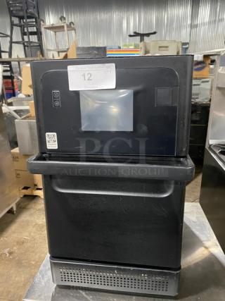 MerryChef commercial black electric countertop high-speed rapid cook oven, late model, with control panel, good condition.