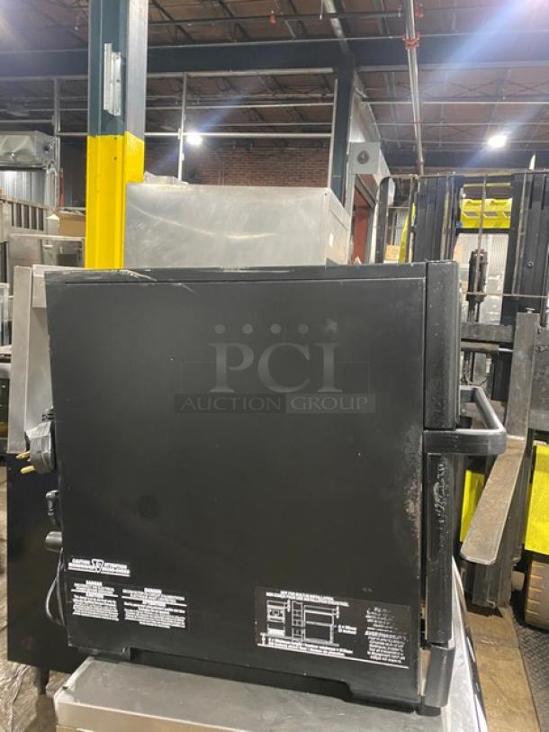 MerryChef black high-speed rapid cook oven, electric-powered, late model. Visible labels show model specs. Good condition.