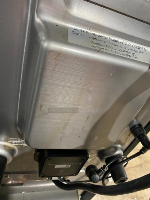 MerryChef commercial black electric high-speed rapid cook oven, late model, countertop design, shown with labels and markings.