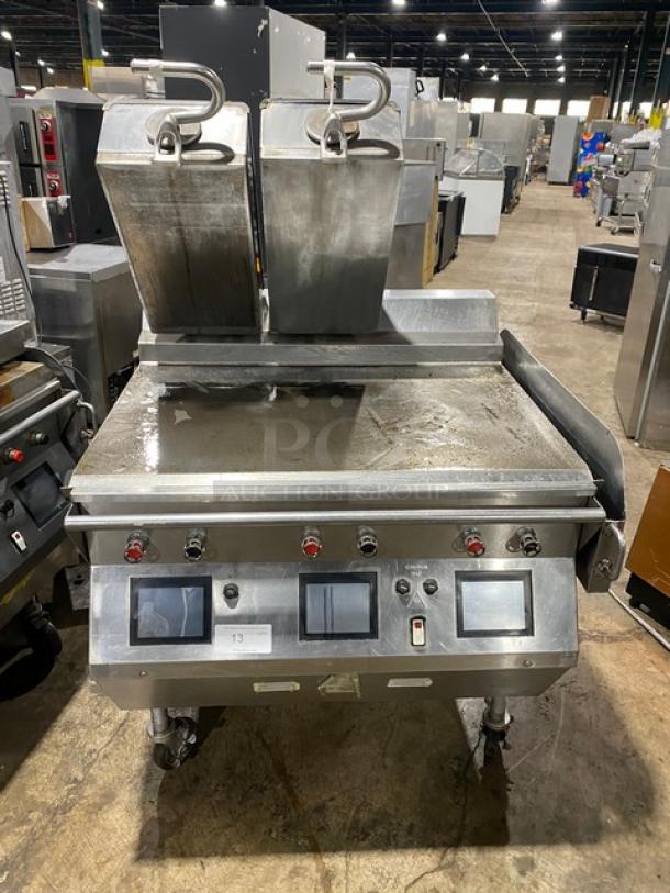 Taylor L813 36" stainless steel flat griddle with dual-sided platens, programmable controls, gas/electric powered, on casters.