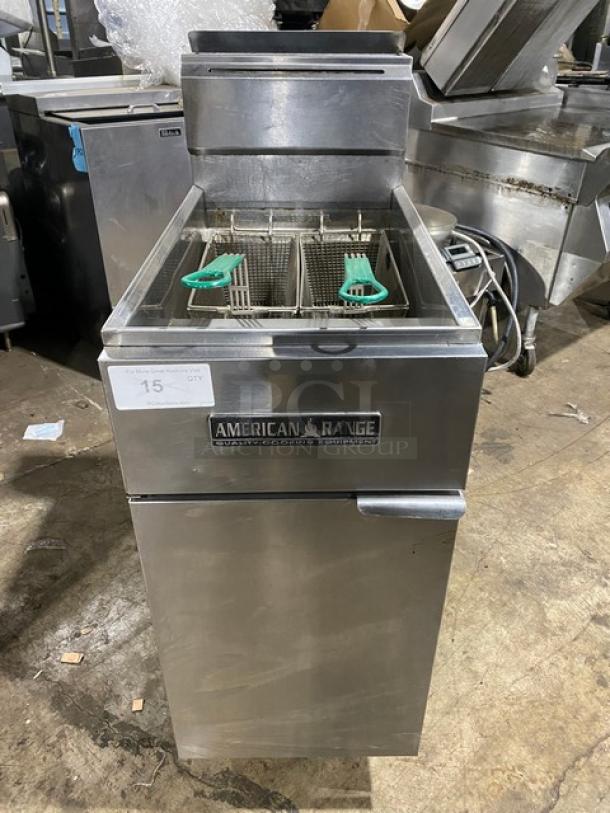 American Range commercial stainless steel gas fryer with back splash, basket hanger, fry basket, on legs; clean condition.