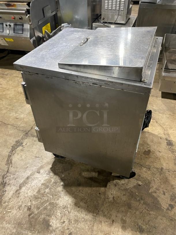 Beverage-Air SP27 stainless steel refrigerated Bain Marie prep table, single door, poly coated rack, on casters, used.