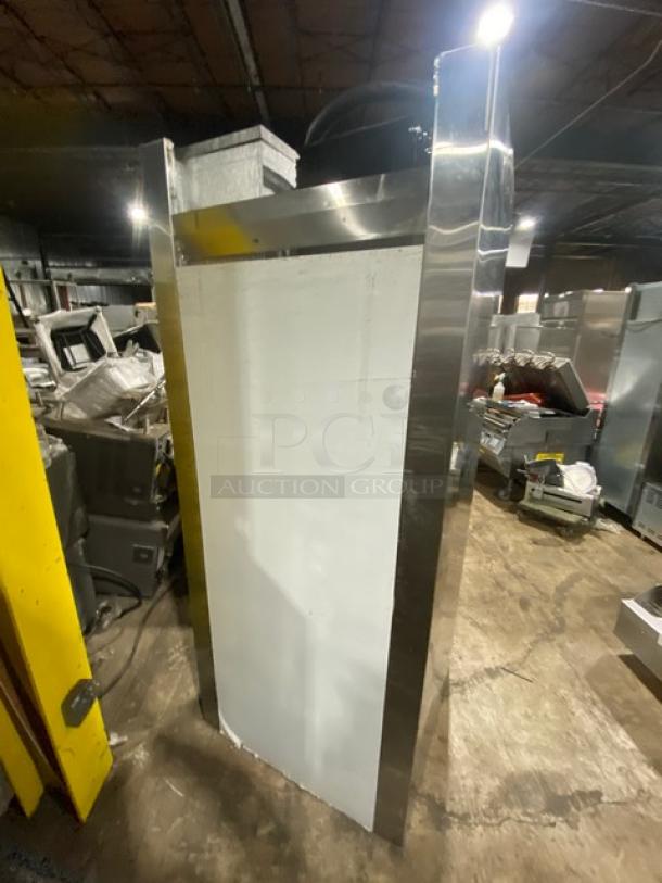Traulsen commercial stainless steel roll-in refrigerator, model RRI132LUT, single door. Serial number 152717, 115V, 1 phase.