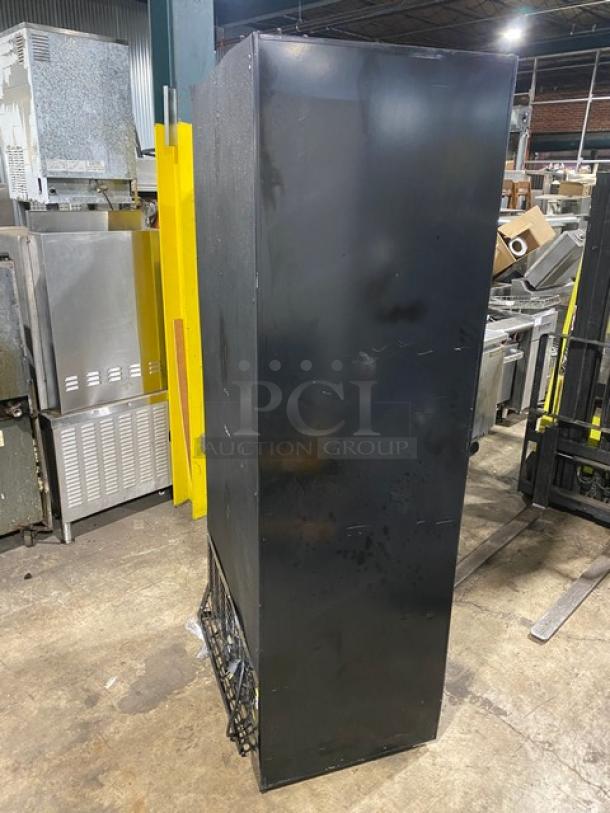 Structural Concepts Oasis Series refrigerated open merchandiser, model B32, black exterior, 3 shelves, pull-down night curtain.