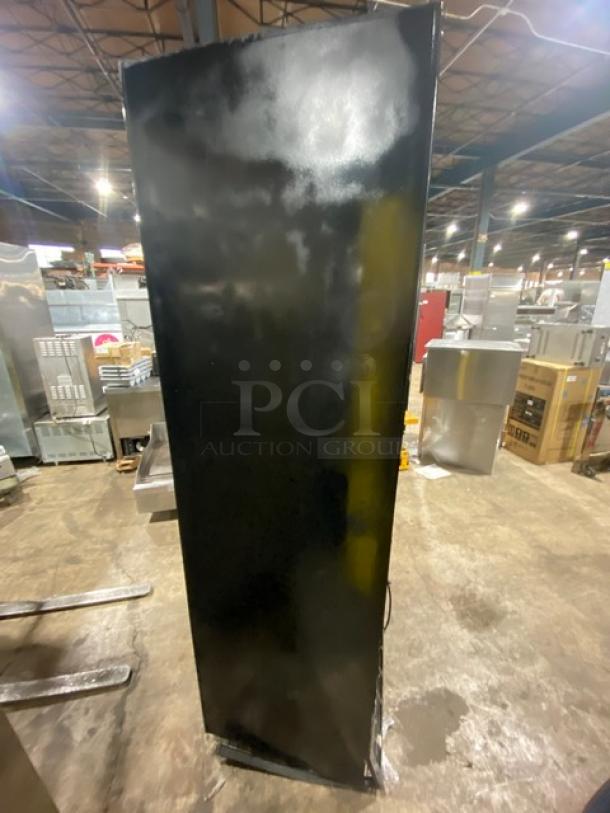 Structural Concepts Oasis Series Model B32 refrigerated merchandiser; black exterior, 3 shelves, pull-down night curtain, 120V 1-phase.