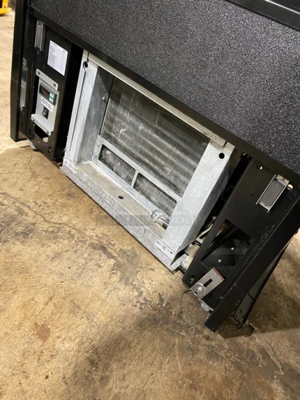 Structural Concepts Oasis Series B32 commercial refrigerated case, 3 shelves, pull-down night curtain, 120V 1 phase.