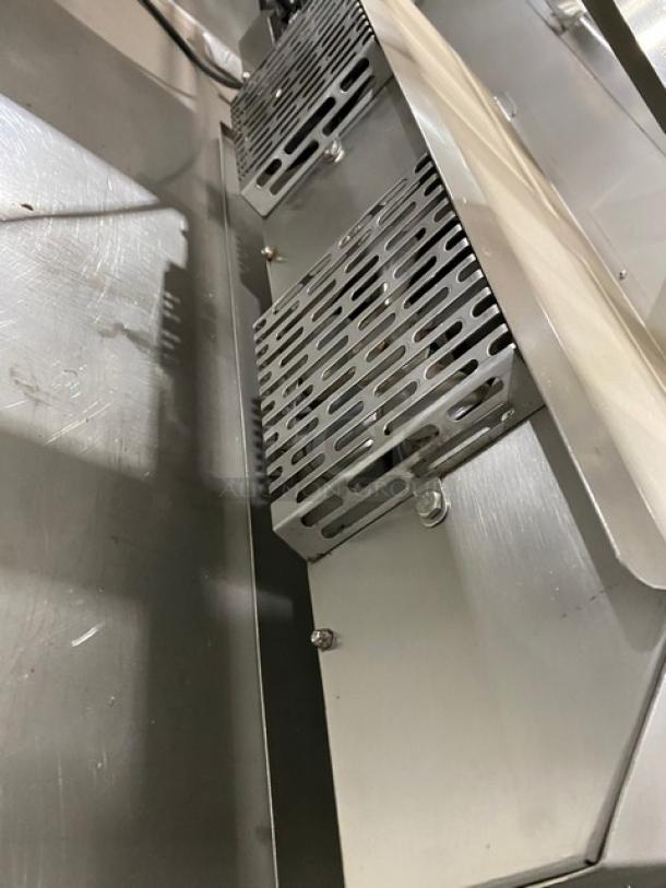 Atlas Metal 60" stainless steel refrigerated salad bar, model WCMBT4, with sneeze guard, tray slide, and storage.