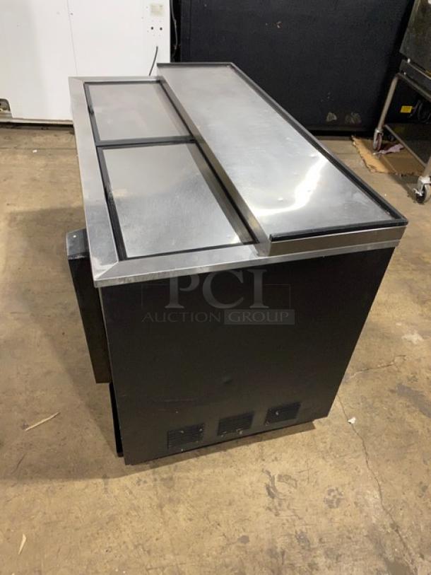 True Commercial 50" Black Bottle Cooler, Model TD-50-18, with stainless steel worktop and dual slide lids. Excellent condition.