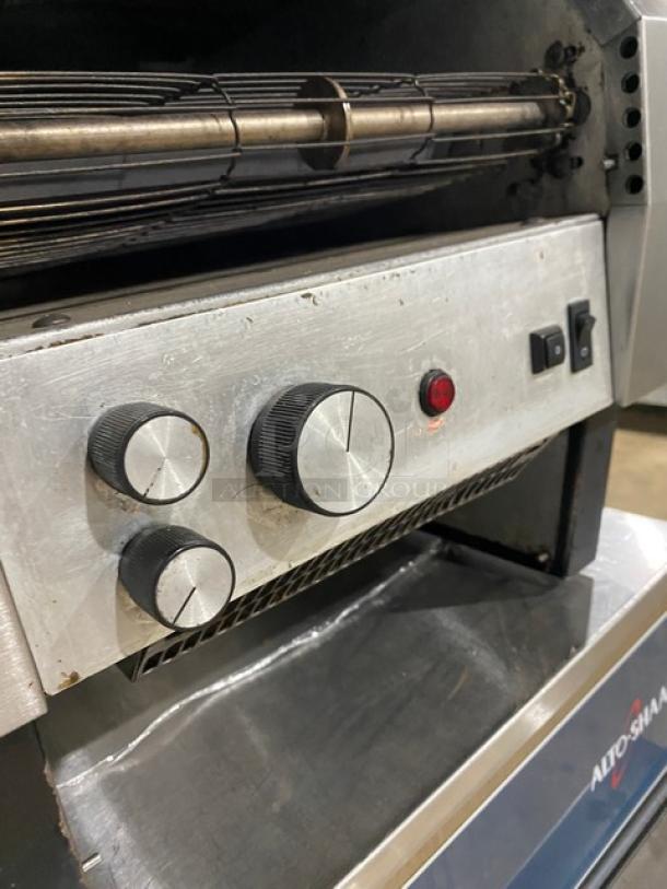Hatco Toast-Qwik Series stainless steel electric conveyor toaster, featuring control knobs, switches, and light indicator.