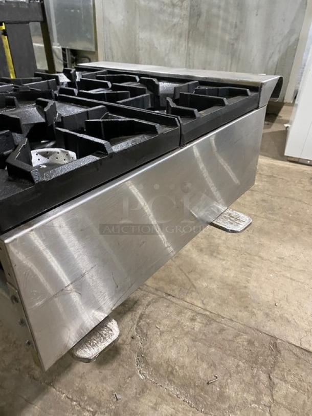 American Range stainless steel gas-powered 4-burner countertop range, commercial-grade, excellent condition.