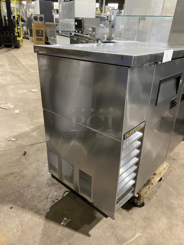 True commercial stainless steel 2-door back bar cooler, Model TBB-24-48S. Features black coated wired rack, 115V, 1 phase.