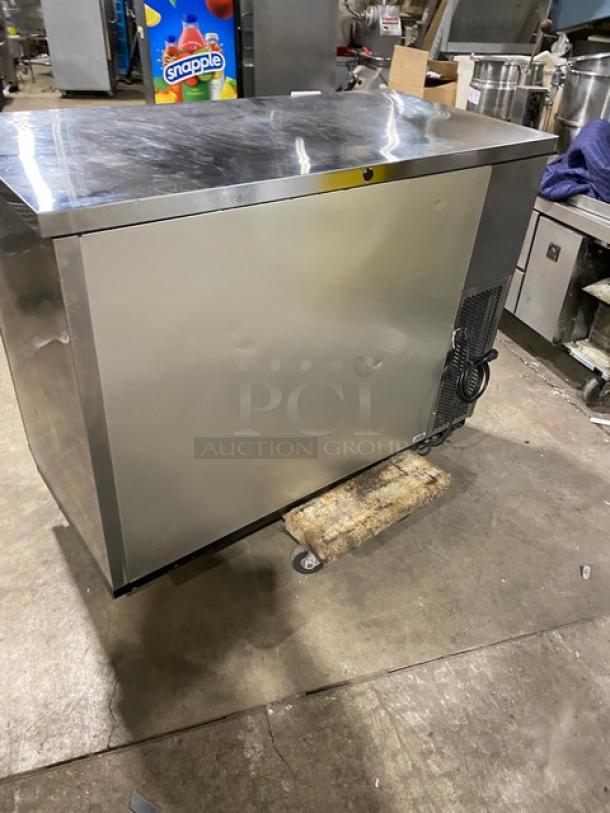 True TBB2448S commercial stainless steel 2-door back bar cooler with black coated wired rack, model in good condition.