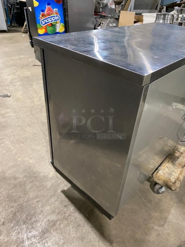 True TBB-24-48S stainless steel 2-door back bar cooler with black coated wired rack, 115V, good condition.