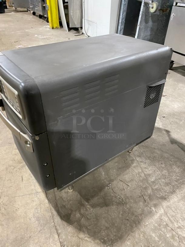 TurboChef NGO countertop rapid cook oven with digital controls, commercial electric model, serial NGOD30390, on legs.