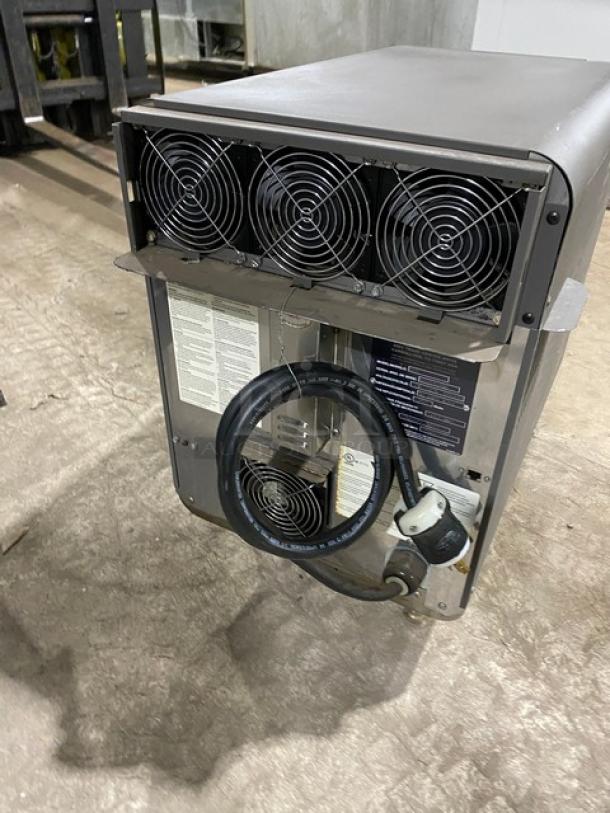 TurboChef NGO countertop rapid cook oven, electric, digital push controls, on legs, visible vent fans and power cord.