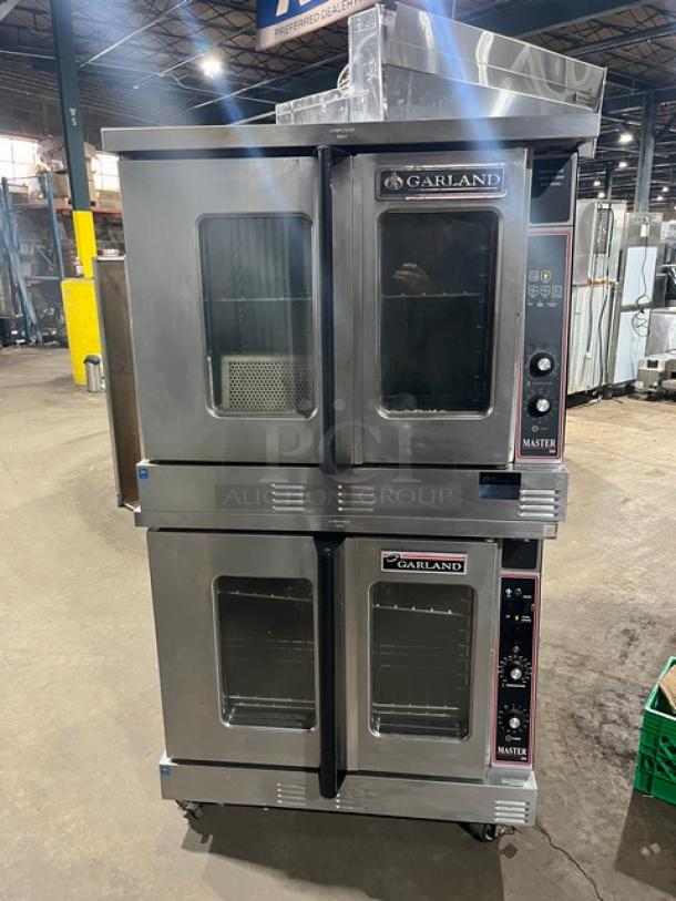 Garland Master 200/300 Series double stacked convection oven, natural gas, view-through doors, wire racks, on casters.