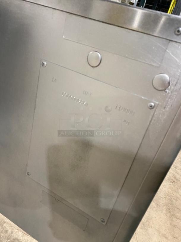 Pitco Frialator Series commercial stainless steel deep fat fryer with back splash, on legs. Natural gas powered.