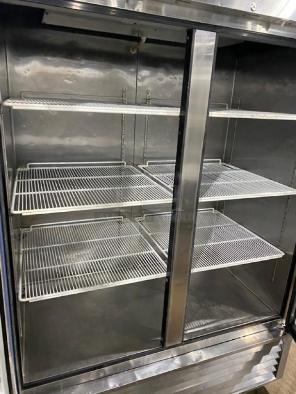 Atosa MCF8707 stainless steel double glass door refrigerator with poly coated wire racks, on casters, 115V 1 phase.