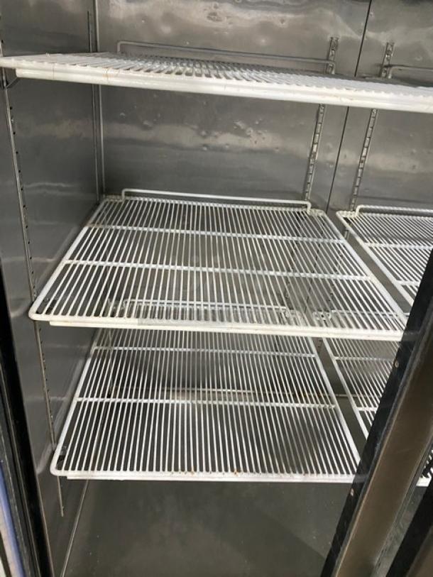 Atosa MCF8707 stainless steel double glass door refrigerator with poly-coated wire racks and casters, model MCF8707.