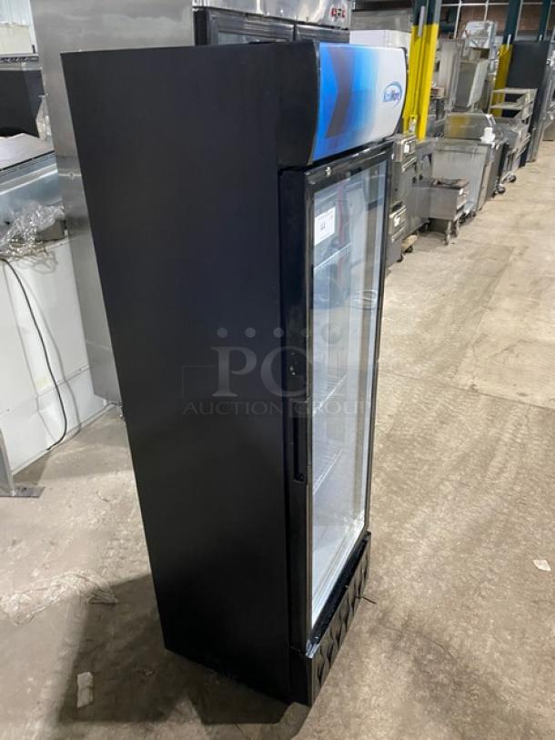 KoolMore MDR9CP commercial black glass door refrigerator with poly-coated rack, in good condition. 115V, ideal for merchandising.