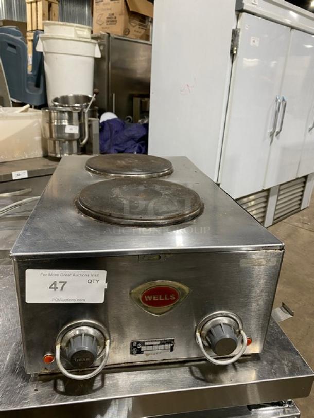 Wells Commercial Stainless Steel 2-Burner Electric Hotplate, Front-to-Back, Individual Controls, Used, Model Tag Visible.