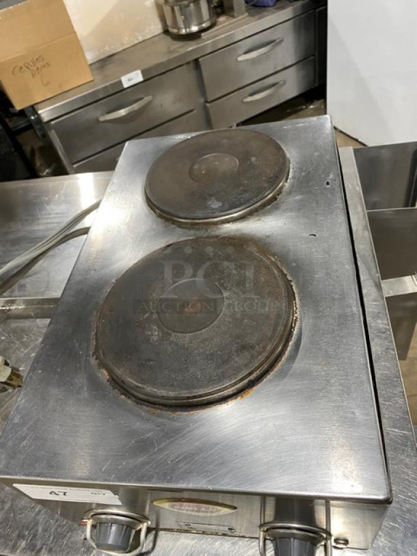 Wells stainless steel electric 2-burner hotplate with front-to-back design and individual controls. Used condition.