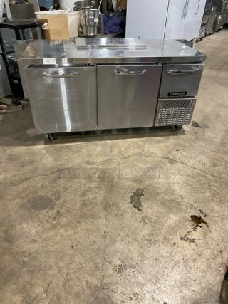 Continental RA6BNB 3-Door Stainless Steel Refrigerated Salad Prep Table on casters, with poly-coated wire rack, 115V.