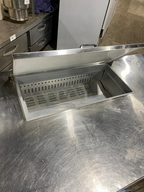 Continental RA6BNB 3-Door Refrigerated Salad/Sandwich Prep Table with poly-coated wire rack, stainless steel, on casters.