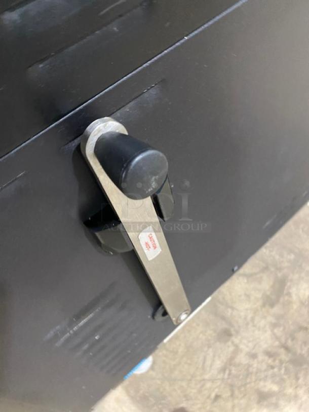 TurboChef NGO rapid cook oven, black, 2021, electric, ventless, countertop model with crank bar, on legs. Model NGO SN: NGOTD44230.