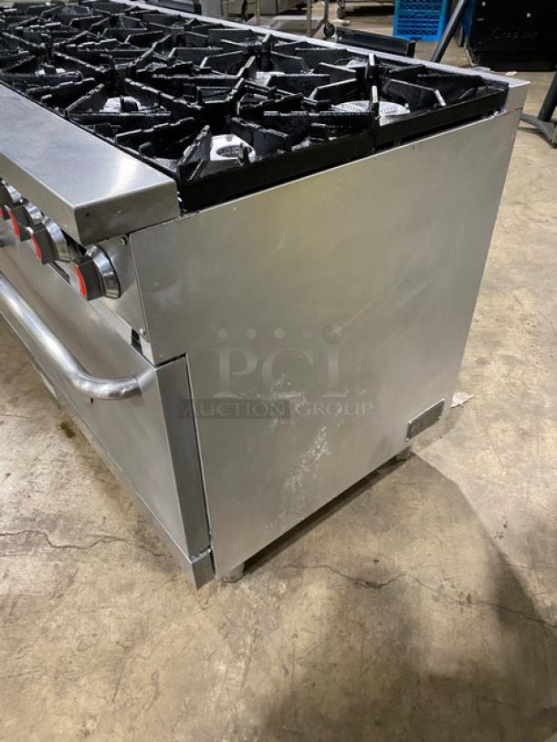 CPG commercial stainless steel 10-burner range/double oven combo with wired rack, gas-powered, robust condition.