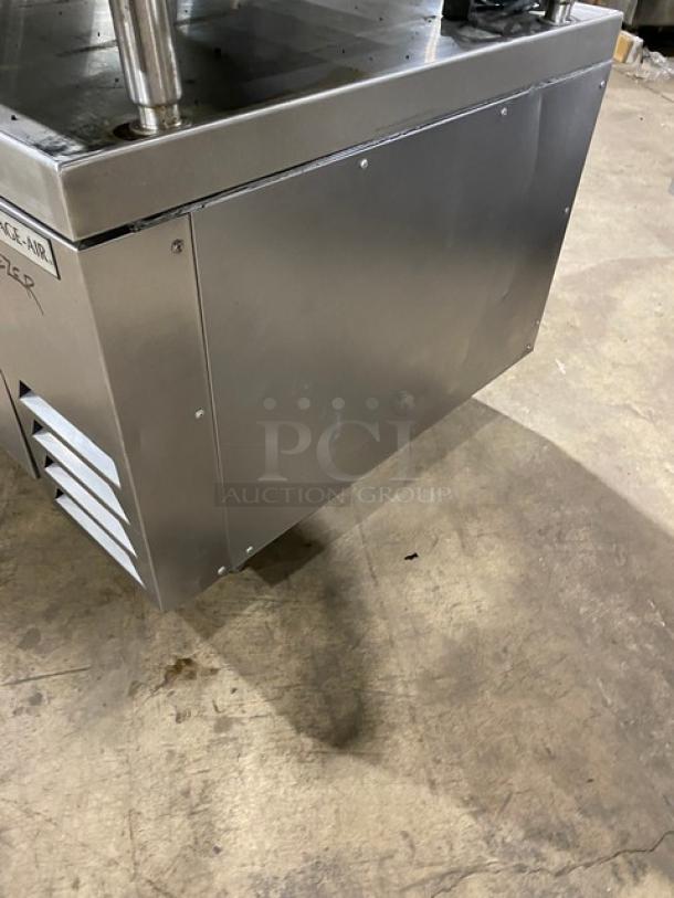 Beverage-Air WTFCS36D1 stainless steel 2-drawer refrigerated chef base with worktop, on casters. Model tag visible.