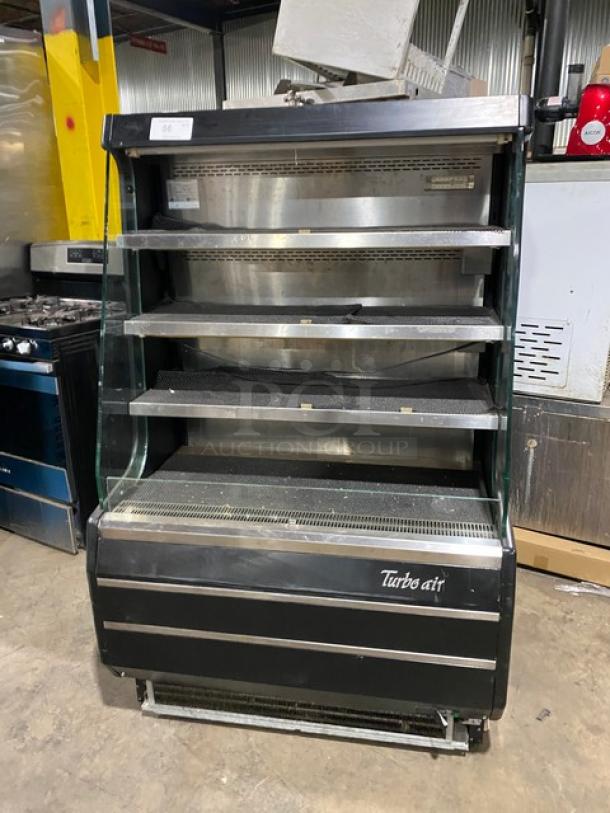 Turbo Air TOM-40M(B) refrigerated display case, black with stainless steel interior, multi-tier, used condition, 120V.