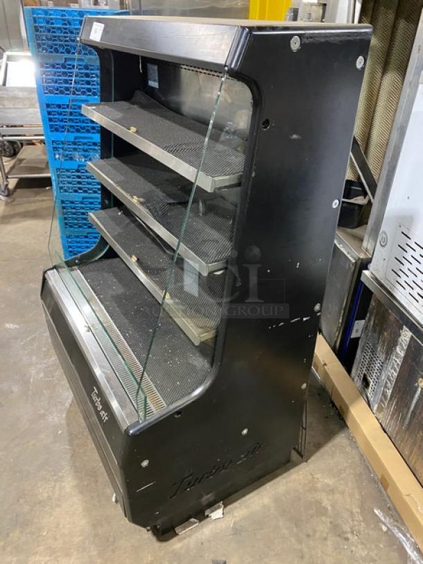 Turbo Air TOM-40M(B) black refrigerated display case, multi-tier, stainless steel interior, 120V, model SN: TMM40146009.
